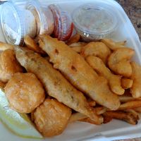 Cod Platter. 1-2 pieces banana blossom cod (depending on sizes available), 3 scallops, 5 shrimp, slaw, fries, tartar sauce, cocktail sauce, chipotle aioli.  at Oh My Cod - Vegan Seafood in Palm Coast