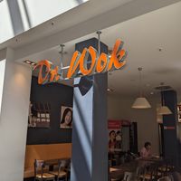 Storefront sign at Dr Wok in Lutherstadt Wittenberg