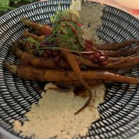 Heirloom carrots with harissa, hummus, and pomegranate   at Arnguli Grill  in Yulara