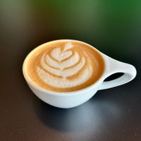 Beautiful latte art on my pumpkin spice oat milk dirty chai 🥰  at ContempoRoast Coffee & Roastery in Centerville