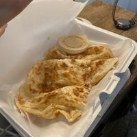 Roti with red curry sauce   at Ploy's Kitchen Thai Cafe in Mandeville