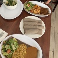 Bersi salad, Tofu tibs, Yellow split peas dish  at Bersi Ethiopian Restaurant in Brooklyn