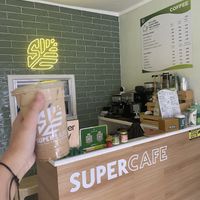 cute instagrammable interior with vegan spanish latte  at SuperCafe PH  in Quezon City