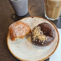 Vegan donuts and an oatmilk latte at Cafe Aamurusko in Tampere