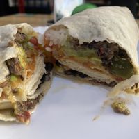 Vegan burrito with extra cashew sauce and chilly  at Toss It in Phnom Penh