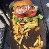 The burger. There were a lot more fries when we got the plate!   at Cafe Møller in Hirtshals