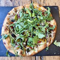 Vegetarian pizza with goats cheese removed for a vegan pizza.  at The Fainting Goat Wine Bar and Restaurant in Wallace