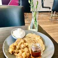 Coconut pancakes with apple and cinnamon compote   at Kook in Bangor