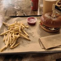 Plant-Based Burger with french fries, very good. 12 euros at To Steki  in Paxos