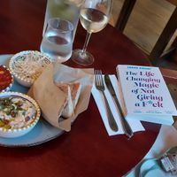 Hummus.  Tomatoes with herbs. Cabbage with sesame.  Pitta breads at Jerusalem By PRAGUE in Prague