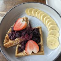 waffles with berries and banana at VEGANERIE Street - วงเวียนใหญ่ in Bangkok