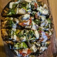 Vegan mushroom pesto pizza at Metta Cafe in Leh