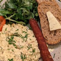Sausage with sourdough bread and scrambled tofu at Salvator Boutique Hotel in Prague