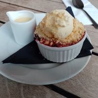 Vegan fruit crumble with ice cream and custard 😋 at Makars Mash Bar - Edinburgh in Edinburgh