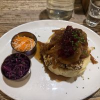 Mash with vegan sausage, caramelized onion gravy, and cranberry saucee  at Makars Mash Bar - Edinburgh in Edinburgh