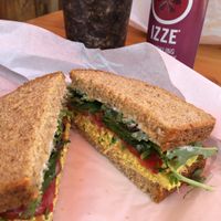 Organic tofu curry salad sandwich on multigrain bread, blueberry spinach smoothie  at Lunchbox Cafe in Ellensburg
