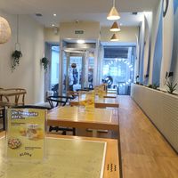 Indoor seating area at Aloha Poké in A Coruna