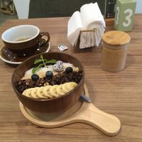 Coconut-milk-based chocolate porridge with fruits at Kia Ora Café in Koh Phangan