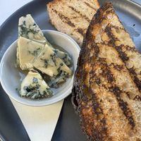 Delicious Climax Blue Cheese with Honey and crusty sourdough.   Sooo good! All vegan!   at Blossom & Root Kitchen in Danville