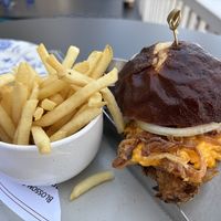 Secret menu fried mushroom burger on a pretzel bun - YUM! 10/10 😋   at Blossom & Root Kitchen in Danville