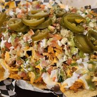 Loaded nachos with vegan chicken!!! at El Compa Vegano in San Fernando