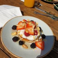 Pancakes with fresh fruits and coconut yoghurt at The Gallery Cafe in East London