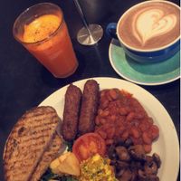 Full English with hot chocolate and turmeric, carrot, black pepper juice at The Gallery Cafe in East London