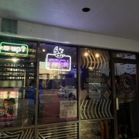 location is under the bars at mid🥸  at Insomnia Cookies in Gainesville