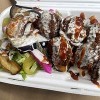 Falafel batata eggplant in a box   at Falafel Highbury in North London
