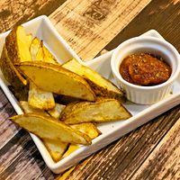 Oven Baked Potato Wedge with homemade ketchup at VegiOasis in Huntington Beach