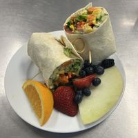 Roasted veggie wrap with fruit   at Saint Peter's Bakery in Saint Peters