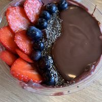 Açai bowl with strawberries, blueberries, chia seeds and vegan nutella  at SMOOCH in Dublin