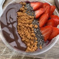 Açai bowl with vegan Nutella, biscoff crumbs, chia seeds and strawberriess  at SMOOCH in Dublin
