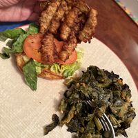 Pretzel boy with collar greens    at Seasoned Vegan Real Quick in New York City
