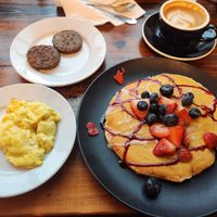 Very berry vegan pancake, Just Egg, and Beyond Meat sausage at Seven Mile Cafe in Denton