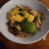 Hashbrown bowl with just egg, vegan sausage, and avocado at Seven Mile Cafe in Denton