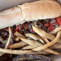 Steak and cheese grinder with friess  at Eat in Springfield