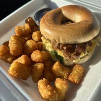 Breakfast sandwich with tots  at Eat in Springfield