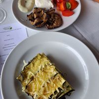 Lasagna di zucchine con formaggio veg e mozzarella veg con pomodorini, melanzane e mayo veg al basilico at Le Bianchette in Verona