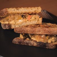 Sándwich kimchi cheddar   at Gusto Creciente  in Lima