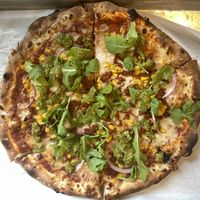 Gaucho pizza: Vegan Chorizo, Vegan Mozzarella, Toasted Corn, Red Onion, Arugula, Red Sauce, Chimichurri finish. Enjoyed with tasty beers, of course 💚  at Saint Paul Brewing in St Paul
