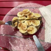 Toast with tahini, banana, cinnamon and agave - delicious! at Masala Natural in Burgos
