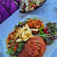 Mixed vegetarian plate with gemista, veggie spaghetti and giant beans at Taverna Maleme Beach Bar in Crete