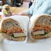 Sourdough baguette with smoked tofu, coleslaw, pickled cucumber, etc. at Kokvrån in Johanneshov