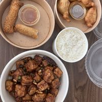 Vegan shrimp, coconut fritters, and kung pao tofu.  at Cisu Vegan House in Hanover