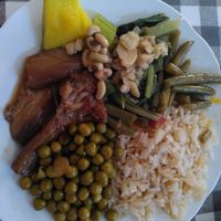Today's menu includes garlicy aubergines, rice, green beans and peas in sauce, broad beans with greens, and black eyed peas with courgette. All traditional vegan dishes. at Mathaios Restaurant  in Nicosia
