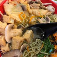 Closer image of kale noodles and tofu from bowl at Soupa Noodle Bar in Jacksonville
