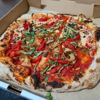 Pizza with half vegan cheese at Treno Pizzeria & Taproom in Temple
