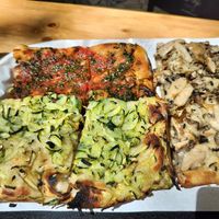 Tomato with herbs (delicious and a bit spicy), zucchini, and mushrooms (amazing!) at Pizza Gegè in Rome