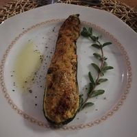 Filled zucchini. One course of the dinner at La Casa di Melo - Organic Farm in Siracusa